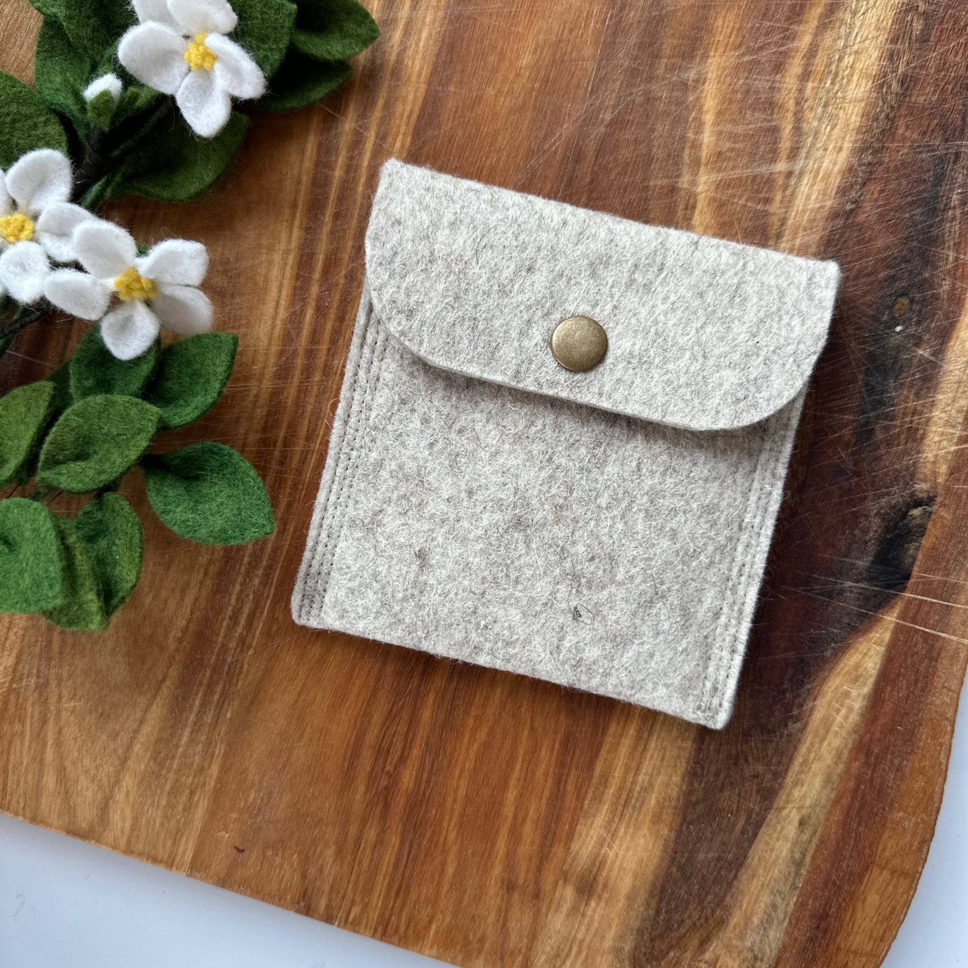 Natural beige merino felt small pouch with bronze press stud 