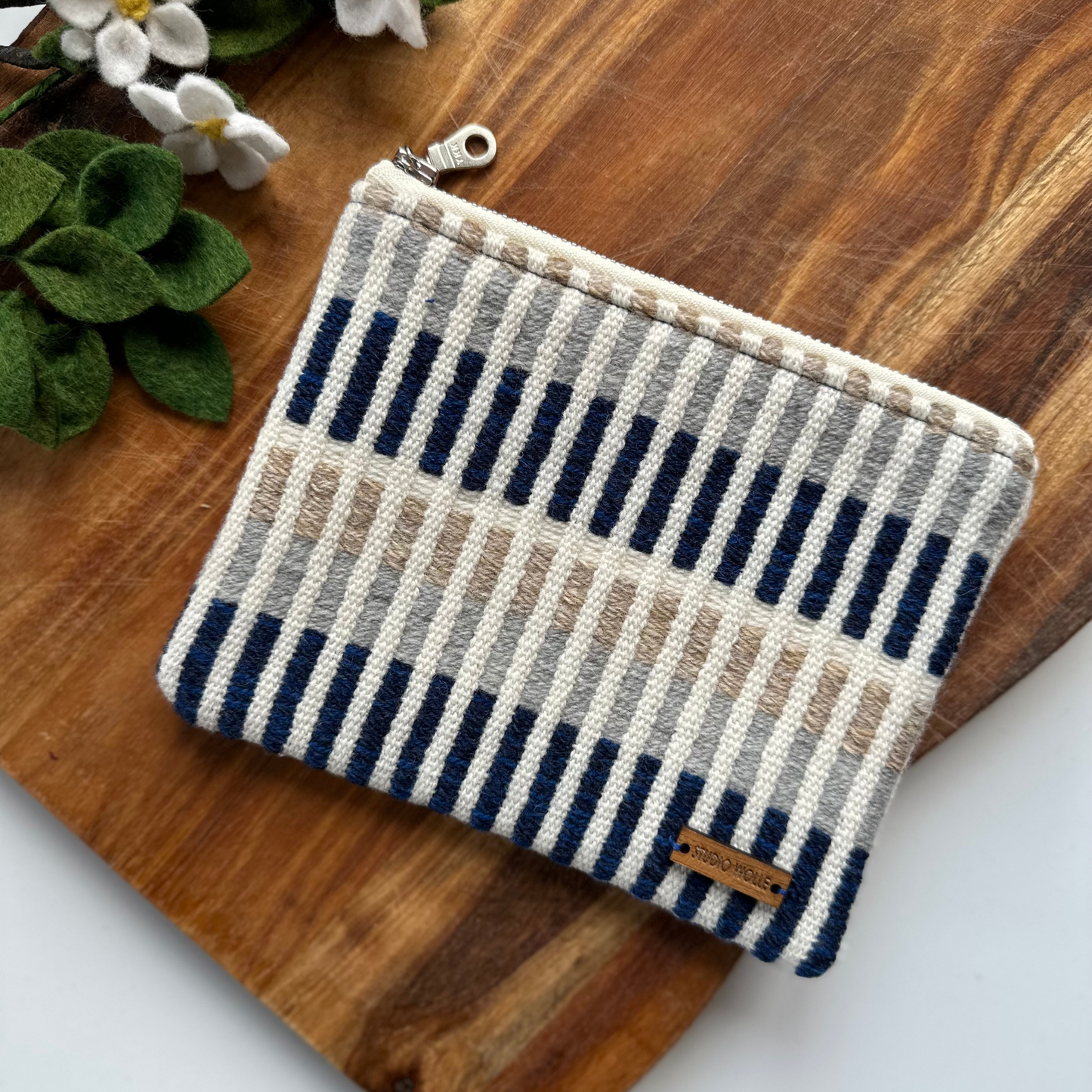 blue striped zip pouch